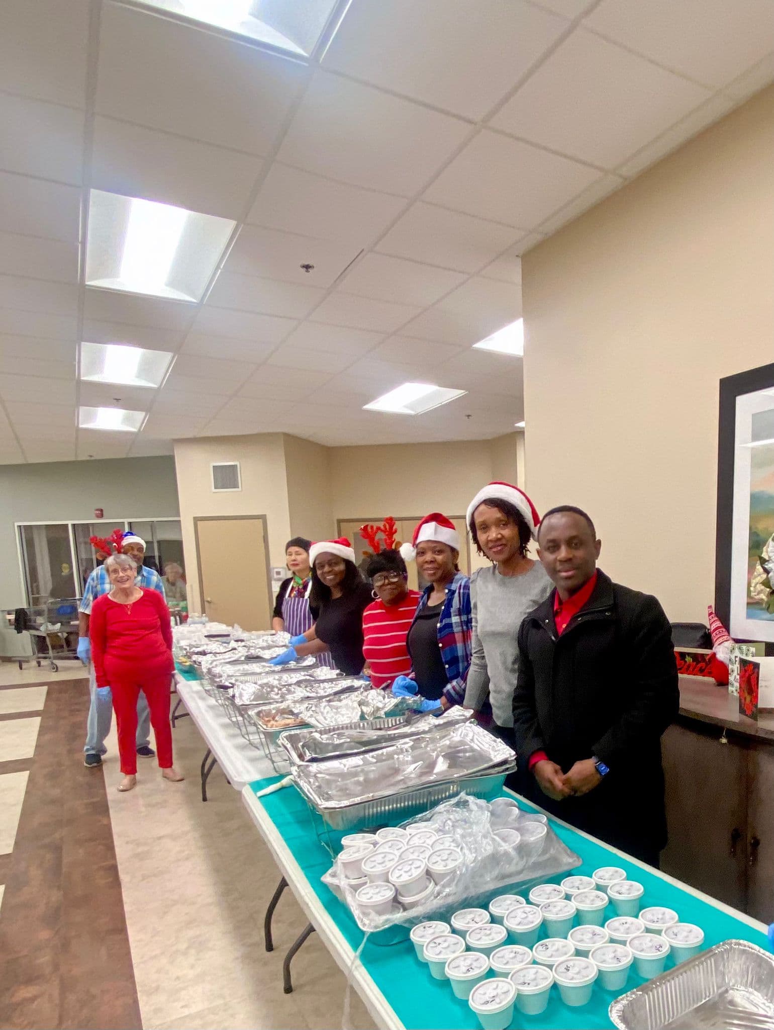 DNL board members serving food at community event